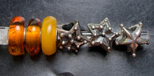 Load image into Gallery viewer, 6-10 Trollbeads Amber + Stars
