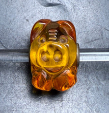 Load image into Gallery viewer, 6-16 Trollbeads Carved Amber Piggy
