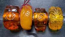 Load image into Gallery viewer, 7-10 Trollbeads Carved Amber
