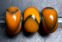 Load image into Gallery viewer, 7-19 Trollbeads Orange Armadillo
