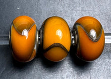 Load image into Gallery viewer, 7-19 Trollbeads Orange Armadillo
